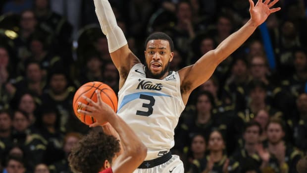 Mar 2, 2024; Orlando, Florida, USA; UCF Knights guard Darius Johnson (3) defends Iowa State Cyclones guard Curtis Jones (5) during the second half at Addition Financial Arena. Mandatory Credit: Mike Watters-USA TODAY Sports